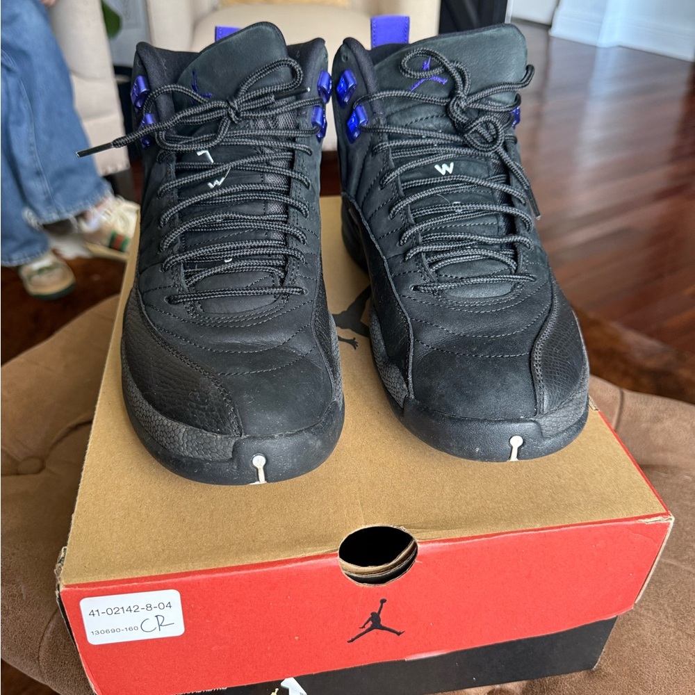 Air Jordan 11 Retro Men's Black and Purple Sneakers
